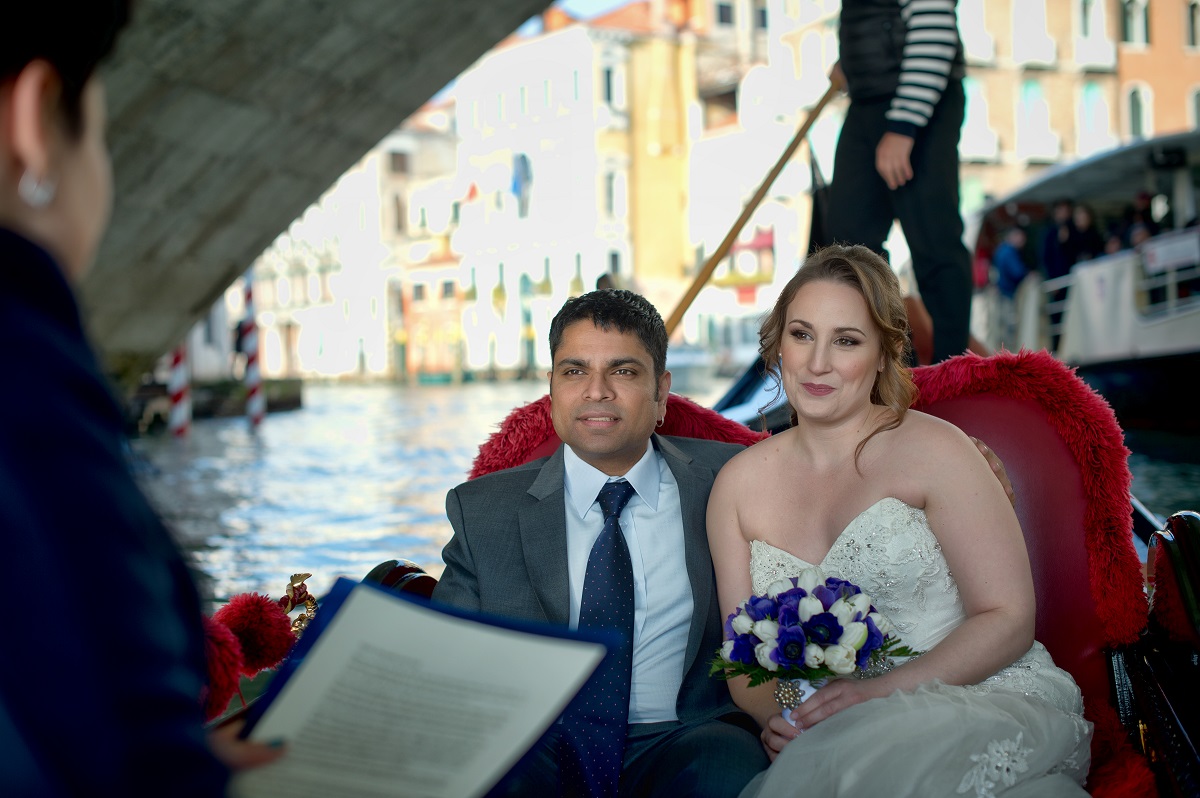 Spouses on a Gondola having their symbolic ceremony during an Elopement