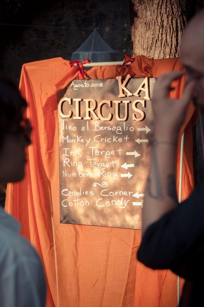 Signpost with directions for Victorian games at an open air ceremony